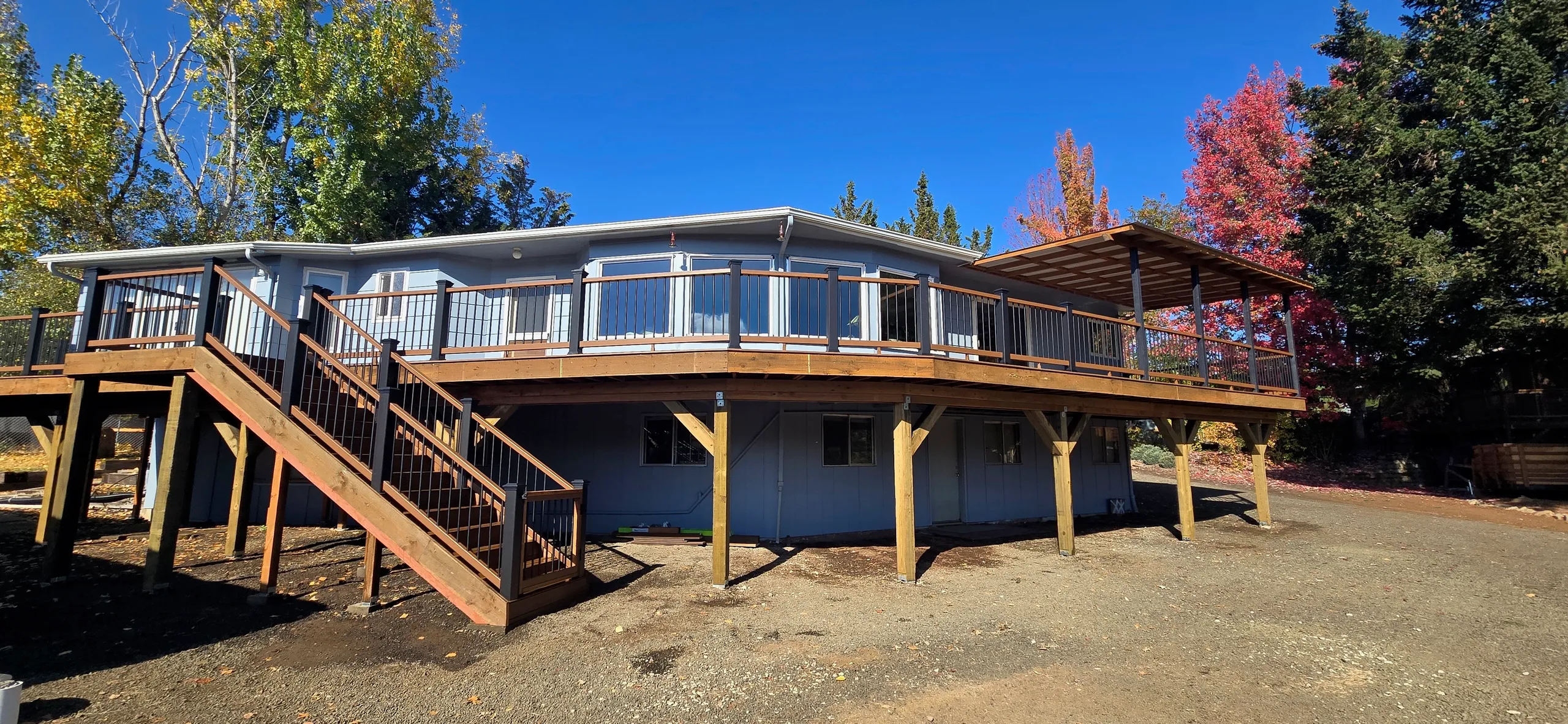 Wraparound deck with fall foliage