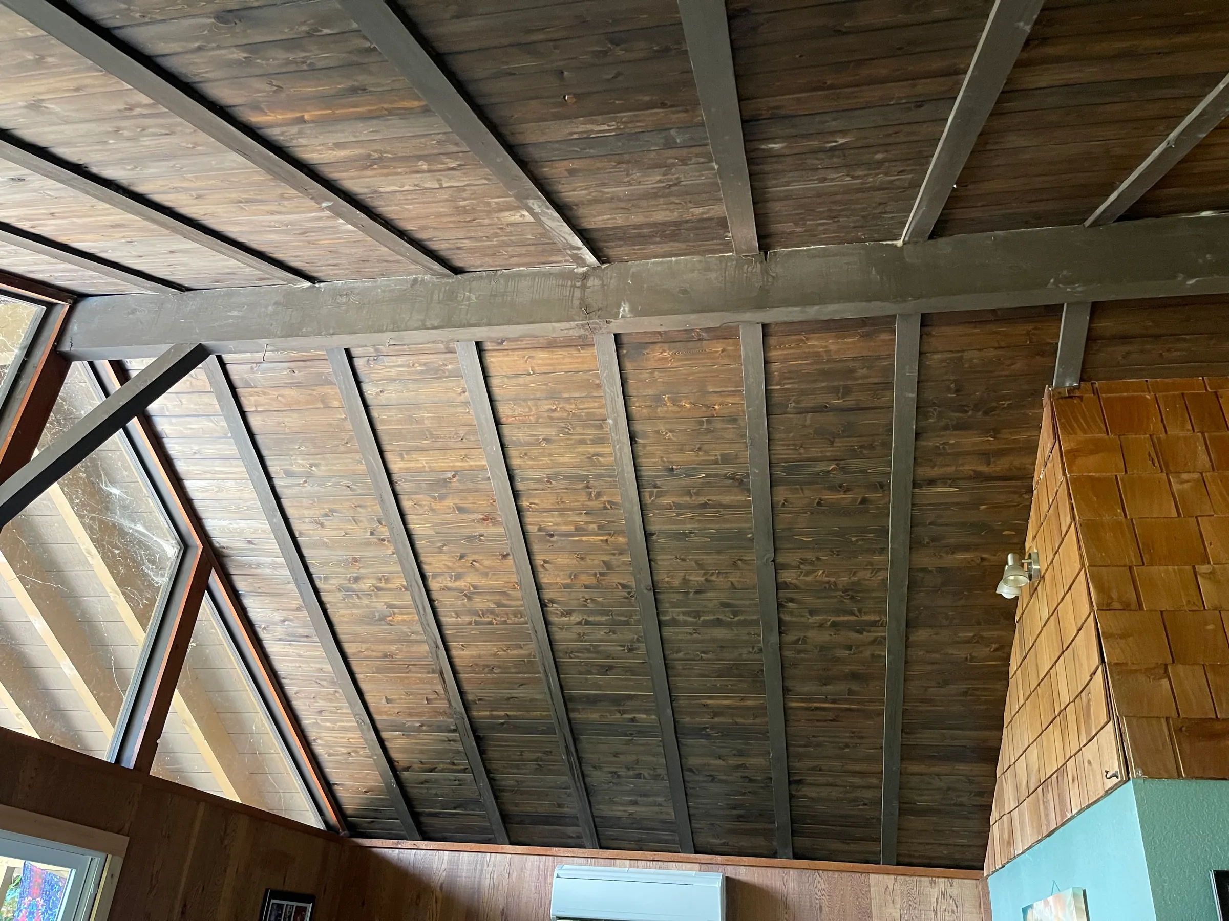 Vaulted wood ceiling with steel beams
